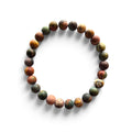 The Artisan men’s bracelet with 8mm Picasso Jasper gemstone beads in olive, rust, slate, and neutral tones on a white background.